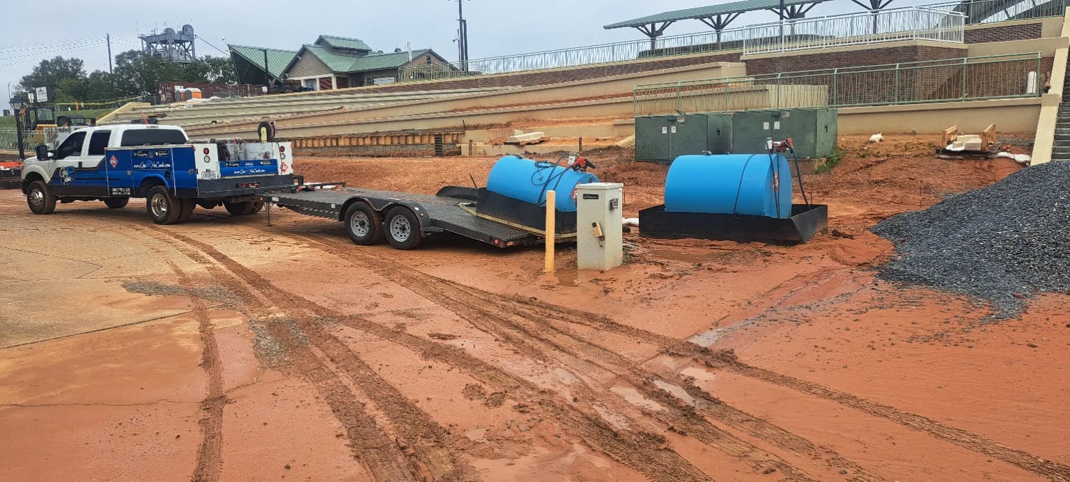 Gas 2 You service truck delivering job-site fuel tanks